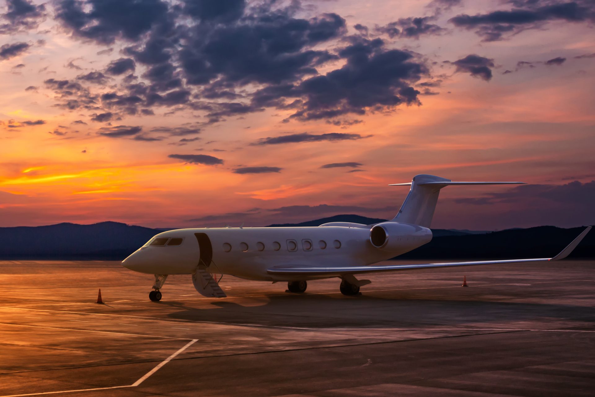 Aircraft on the apron at sunrise
