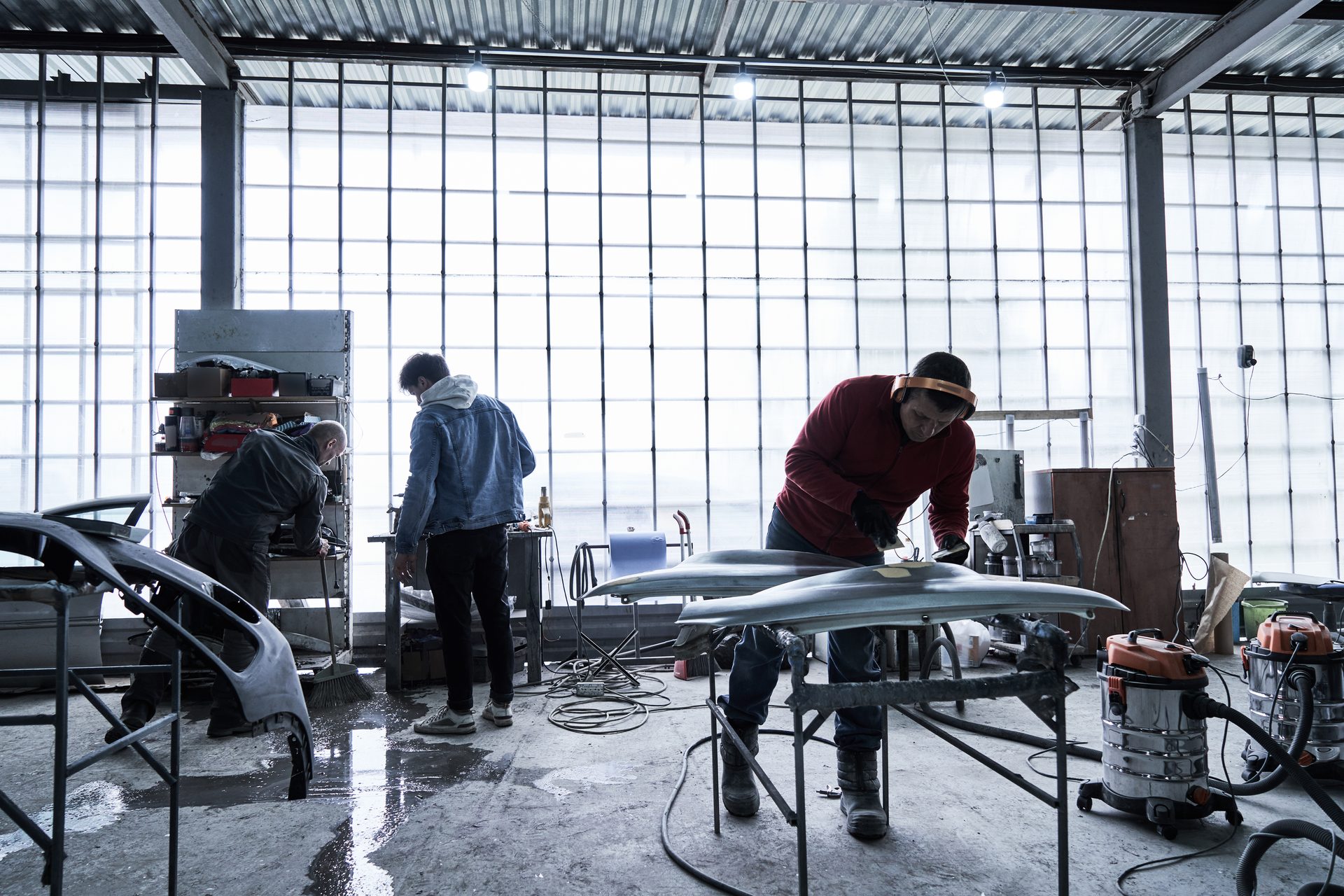 Bosio engineers working in the hangar