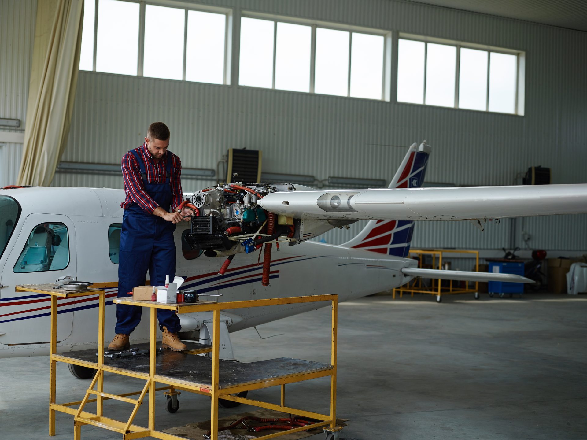 Aircraft under maintenance inside the hangar